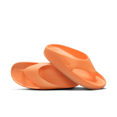 Orange nike slides hotsell